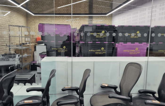 Edward Baden movers reassembling and reinstalling OEUK office furniture and IT equipment